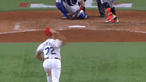A Baseball Player With The Number 11 On His Jersey Is Sliding Into Home Plate GIF