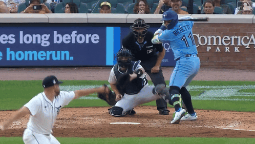 A Baseball Player With The Number 11 On The Back Of His Shirt GIF