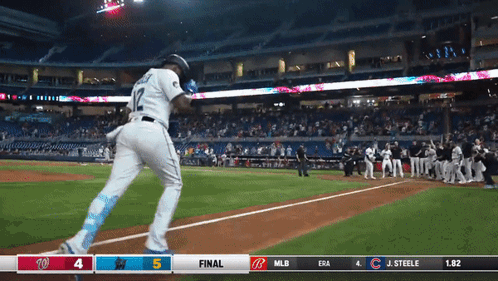 A Baseball Player With The Number 12 On His Back GIF