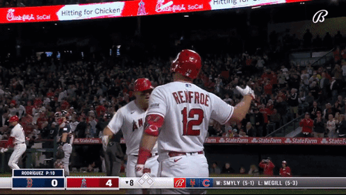 A Baseball Player With The Number 12 On The Back Of His Uniform GIF