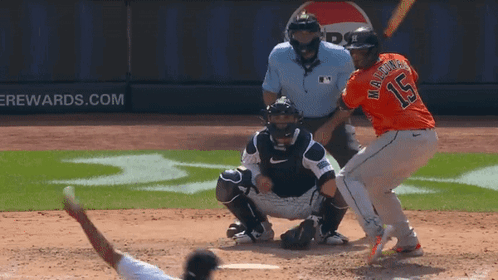 A Baseball Player With The Number 15 On His Jersey Is At Bat GIF