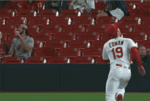 A Baseball Player With The Number 16 On His Jersey Is Laying On The Field GIF