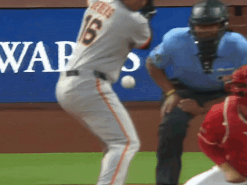 A Baseball Player With The Number 16 On His Jersey Swings At A Ball GIF