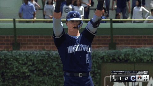 A Baseball Player With The Number 2 On His Jersey Holds His Arms In The Air GIF