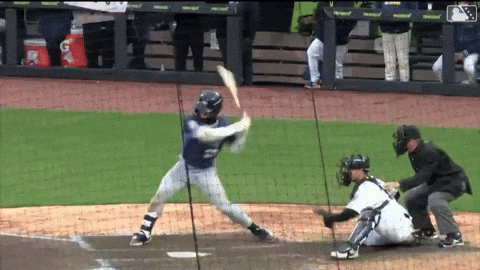 A Baseball Player With The Number 2 On His Jersey Is Swinging At A Pitch GIF