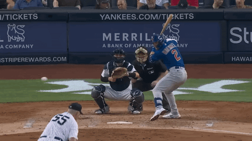 A Baseball Player With The Number 2 On His Jersey Swings His Bat GIF