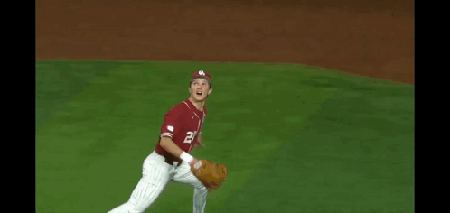 A Baseball Player With The Number 20 On His Shirt GIF
