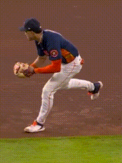 A Baseball Player With The Number 21 On His Back Is Getting Ready To Catch The Ball GIF