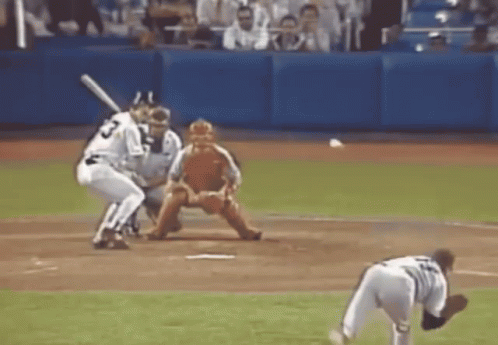 A Baseball Player With The Number 23 On His Jersey Is Swinging At A Pitch GIF