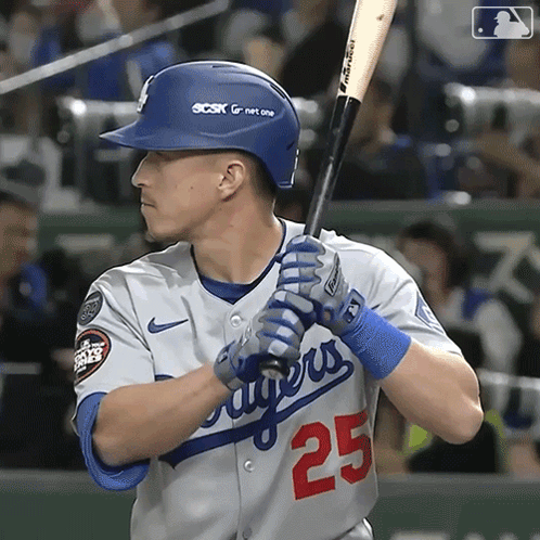 A Baseball Player With The Number 25 On His Shirt GIF