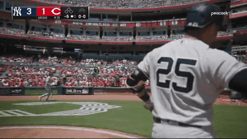 A Baseball Player With The Number 25 On The Back Of His Uniform GIF