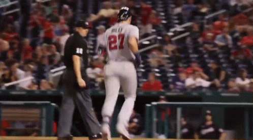 A Baseball Player With The Number 27 On The Back Of His Shirt GIF