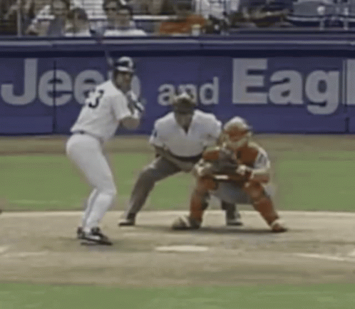 A Baseball Player With The Number 3 On His Jersey Swings At A Pitch GIF