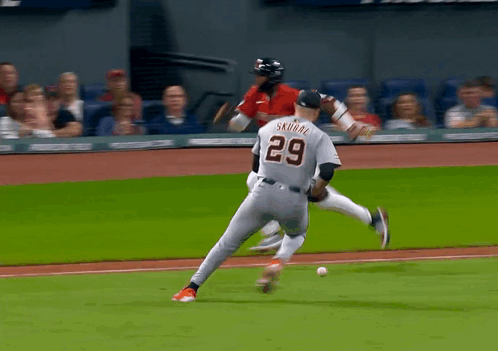 A Baseball Player With The Number 33 On His Jersey GIF