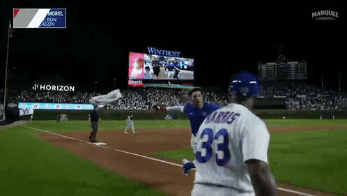 A Baseball Player With The Number 33 On Their Jersey GIF