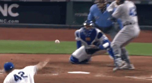 A Baseball Player With The Number 42 On The Back Of His Shirt GIF