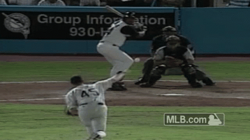 A Baseball Player With The Number 45 On The Back Of His Jersey Swings At A Pitch GIF