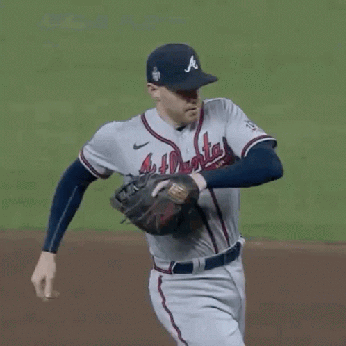 A Baseball Player With The Number 5 On His Back Is Trying To Steal A Base GIF