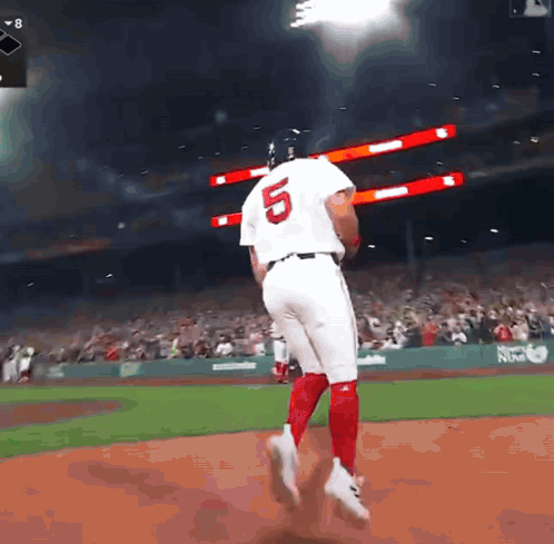A Baseball Player With The Number 5 On His Back GIF