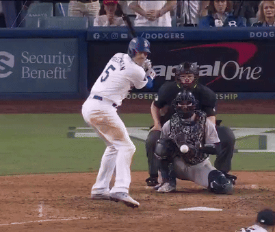 A Baseball Player With The Number 5 On His Shirt GIF