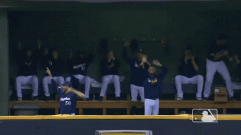 A Baseball Player With The Number 50 On The Back Of His Shirt GIF