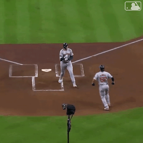 A Baseball Player With The Number 52 On His Jersey Is Running Towards The Base GIF