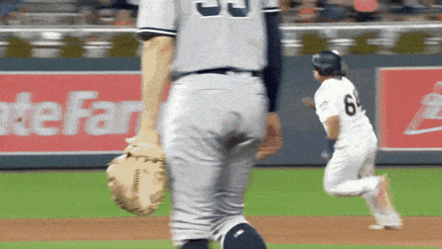 A Baseball Player With The Number 6 On His Jersey Is Running Towards The Base GIF