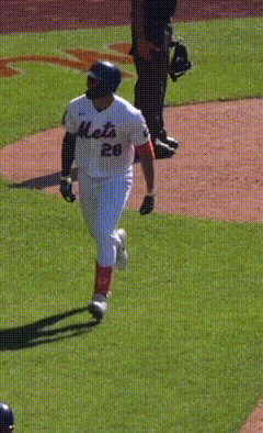 A Baseball Player With The Number 65 On Their Back GIF