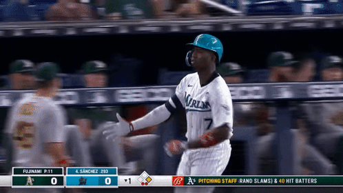 A Baseball Player With The Number 7 On His Jersey Is Running Towards Home Plate GIF