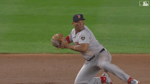A Baseball Player With The Number 75 On His Back Is Running GIF