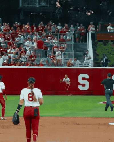 A Baseball Player With The Number 8 On Her Back GIF