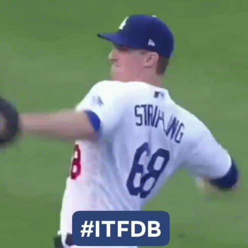 A Baseball Player With The Number 8 On His Jersey Is Throwing A Ball GIF