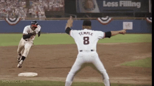 A Baseball Player With The Number 8 On The Back Of His Shirt GIF