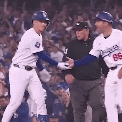 A Baseball Player With The Number 86 On His Jersey Is Talking To An Umpire GIF
