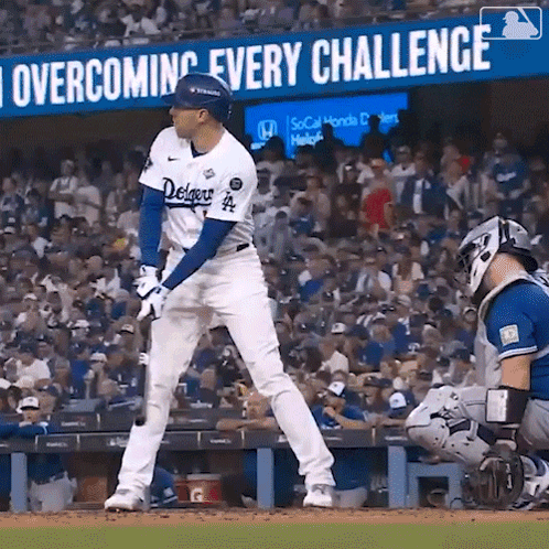 a baseball player with the word dodgers on his uniform