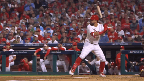 A Baseball Player With The Word Phillies On His Shirt GIF