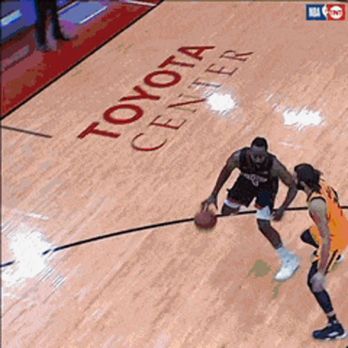 A Basketball Game Being Played At The Toyota Center GIF