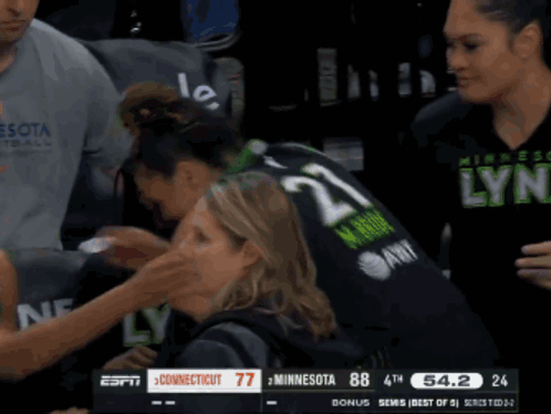 A Basketball Game Between Minnesota And Connecticut Is Going On GIF