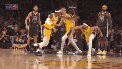 A Basketball Game Between The Lakers And Golden State Warriors Is Being Broadcast On Tnt GIF