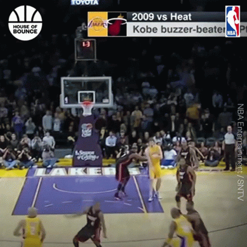 A Basketball Game Between The Lakers And Heat Is Being Played GIF