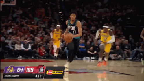 A Basketball Game Between The Lakers And The Phoenix GIF