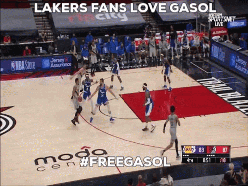 A Basketball Game Between The Lakers And The Trailblazers GIF