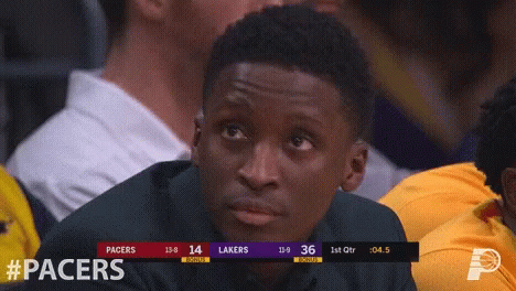 A Basketball Game Between The Pacers And Lakers GIF