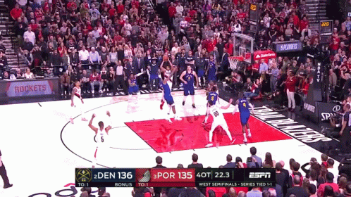 a basketball game between the rockets and the blazers