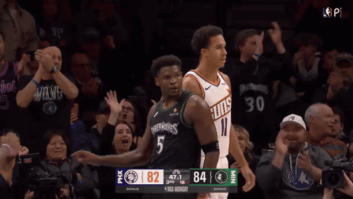 A Basketball Game Between The Suns And The Wolves Is Being Played GIF