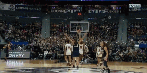 A Basketball Game Between Uconn And The Huskies Is Going On GIF