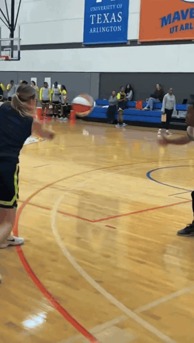 A Basketball Game Is Being Played At The University Of Texas In Arlington GIF