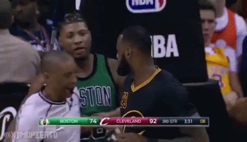 A Basketball Game Is Being Played Between Boston And Cleveland . GIF