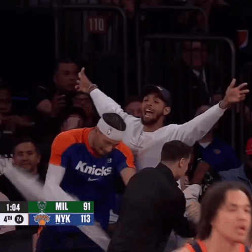 A Basketball Game Is Being Played Between Milwaukee And The New York Knicks GIF