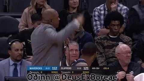A Basketball Game Is Being Played Between The Mavericks And The Clippers GIF